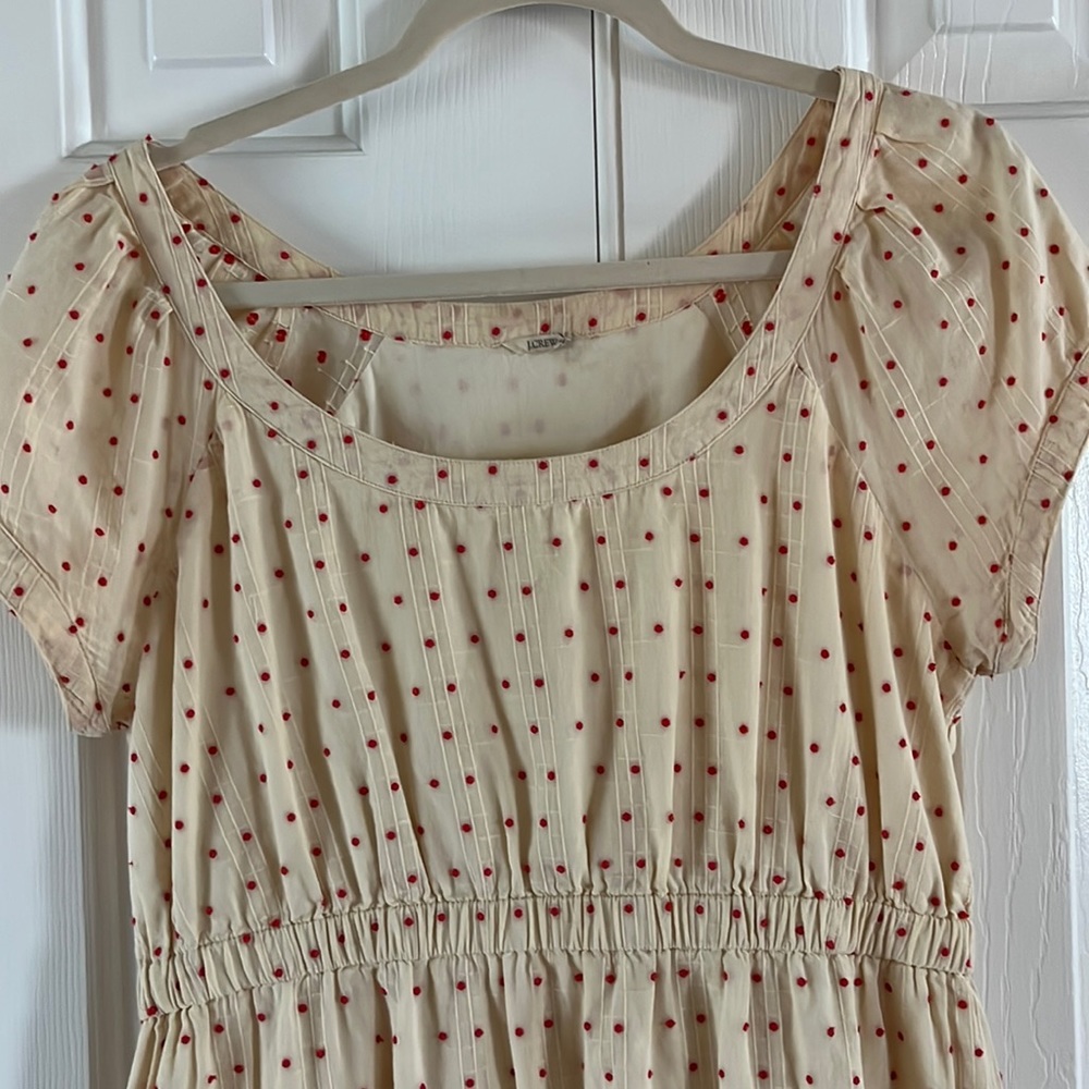 J.crew cream dress with red raised polka dots.